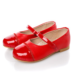 Children's red leather shoes for girls. isolated on white. Side view