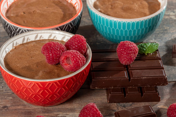 Homemade chocolate mousse with fresh raspberry