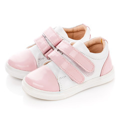White with pink shoes for girls isolated on white. Side view