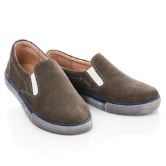 Brown suede shoes for boys isolated on white