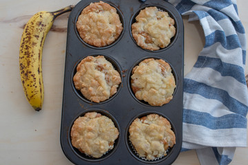 Home made banana muffins on the wooden table