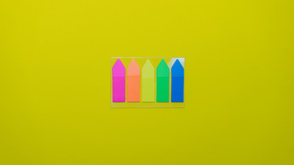 collection of colorful post it paper note on yellow background
