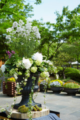 Flower arrangement in vase at wedding party