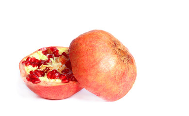 Ripe pomegranate fruit on white background cutout
