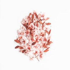 Flowers composition. Eucalyptus branches, pink flowers on white background. Valentines day, mothers day, womens day concept. Flat lay, top view