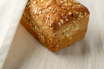 Homemade Traditional Bread on White Fabric Background