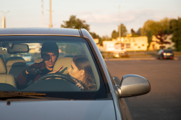 A man armed with a knife attacked a defenseless woman in a parking lot. The rapist is trying to...