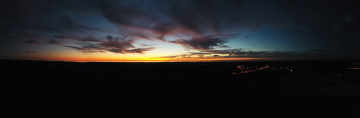 An aerial shot of a sunset, panorama