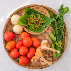 Organic vegtable background vegetables in the wooden tray.