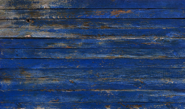 Blue Wall Of Old Boards With Peeling Paint