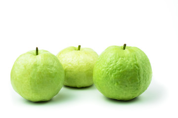 guava are fresh green fruit. rich in vitamins have a taste sour and sweet on isolated white background and clipping path. The name of science : Psidium guajava