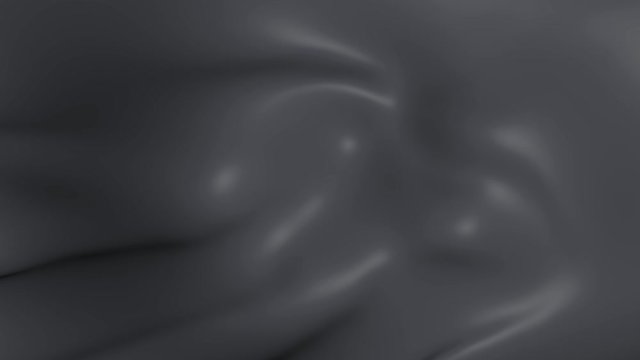 The grey smooth fabric moves. Background of waves of dark canvas.