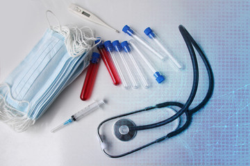 medical laboratory test tubes, stethoscope, syringe, disposable protective masks, personal...