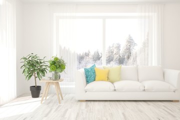 Modern living room in white color with sofa and winter landscape in window. Scandinavian interior design. 3D illustration