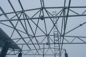 metal frame for the roof of the hangar