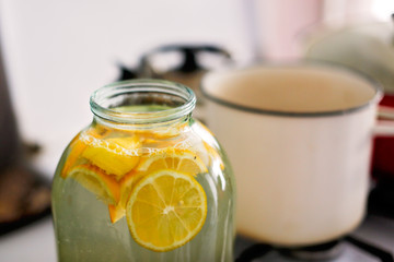 Slicing lemon slices for making lemonade