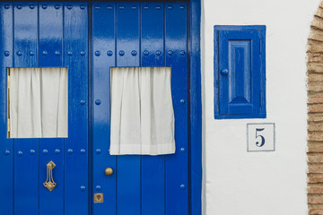 Nice typical blue door background of Frigiliana, Andalucia, Spain.