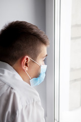 Young Man in Flu Mask