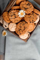 Cookie tray on a blue tablecloth. top view