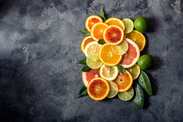 Sliced citrus fruits, top view, copy space background - 325668429