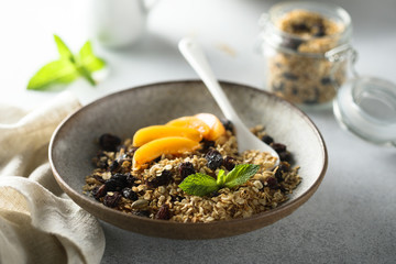 Homemade granola with fresh apricot
