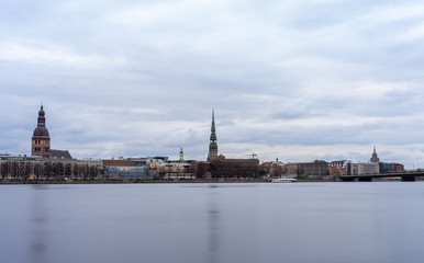 Fototapeta na wymiar April 24, 2018 Riga, Latvia. View of the Old Town in Riga from the opposite bank of the Daugava River.