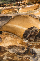 Detail shot of the sandstone textures in Bouddi National Park.