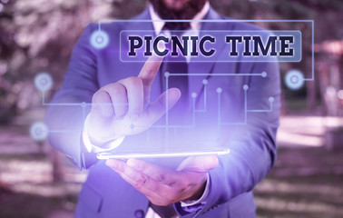 Conceptual hand writing showing Picnic Time. Concept meaning period where meal taken outdoors as...