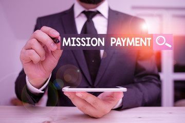 Conceptual hand writing showing Mission Payment. Concept meaning Compensation Discharge or...
