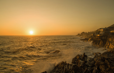 View of Genoa (Genova) Nervi, Italy, cliffs and walk at sunset