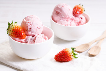 strawberry ice cream scoops with fresh strawberries