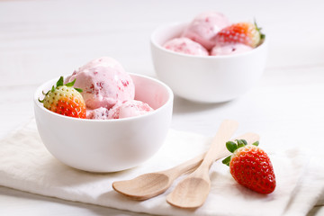 strawberry ice cream scoops with fresh strawberries