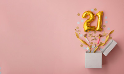 Number 21 birthday balloon celebration gift box lay flat explosion - obrazy, fototapety, plakaty
