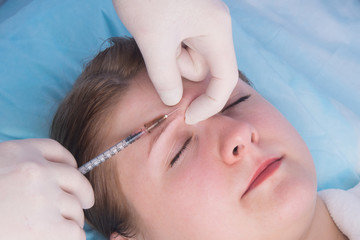 cosmetology, prick a woman's eyebrow, to improve growth