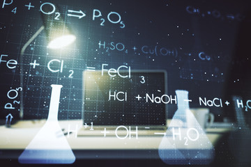 Double exposure of creative chemistry concept on laptop background, research and development concept