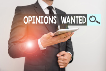 Text sign showing Opinions Wanted. Business photo text judgment or advice by an expert wanted a second opinion Male human wear formal work suit hold smart hi tech smartphone use one hand
