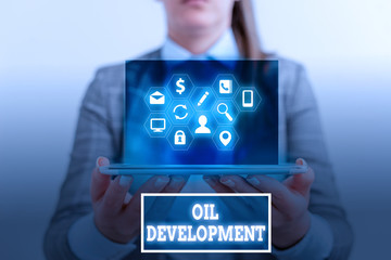 Conceptual hand writing showing Oil Development. Concept meaning act or process of exploring an...