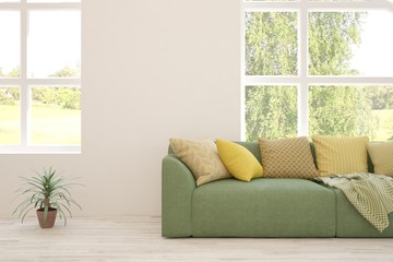 Minimalist living room in white color with sofa and summer landscape in window. Scandinavian interior design. 3D illustration