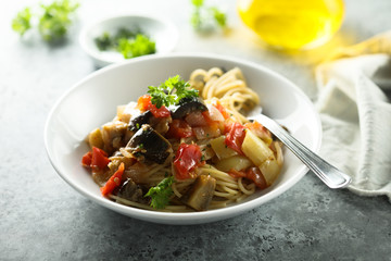 Spaghetti with vegetable ragout and fresh parsley