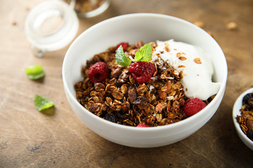 Homemade granola with yogurt and berries