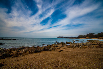 Between the sky and the cliff.