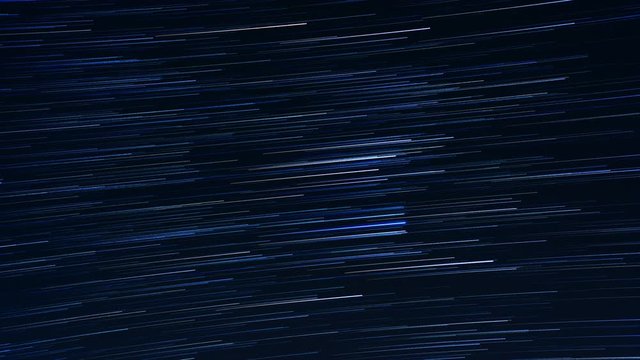 Trails of stars moving across the sky, timelapse. Stars trails.