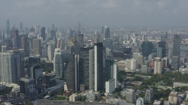 Bangkok Thailand Aerial v172 Flying low around Pathum Wan district with full downtown cityscape Ratchathewi views - January 2020