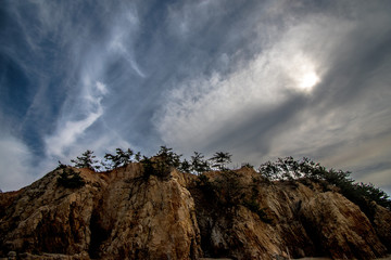 Between the sky and the cliff.