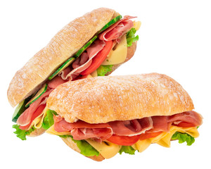 Ciabatta sandwich with lettuce, tomatoes prosciutto and cheese isolated on white background