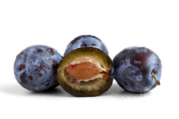 Black plums and plum half