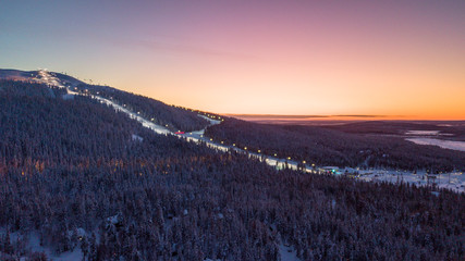 The ski slopes of Levi ski resort at sunrise, Kittilä, Finland. A wintery landscape in Finnish...