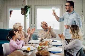 I raise a glass to my happy family!