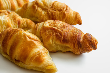 French mini croissants on a white background