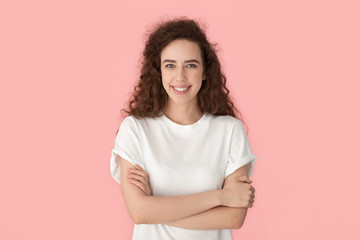 Fototapeta premium Smiling confident young female professional looking at camera portrait.